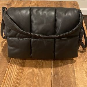 Black handbag by stand studio